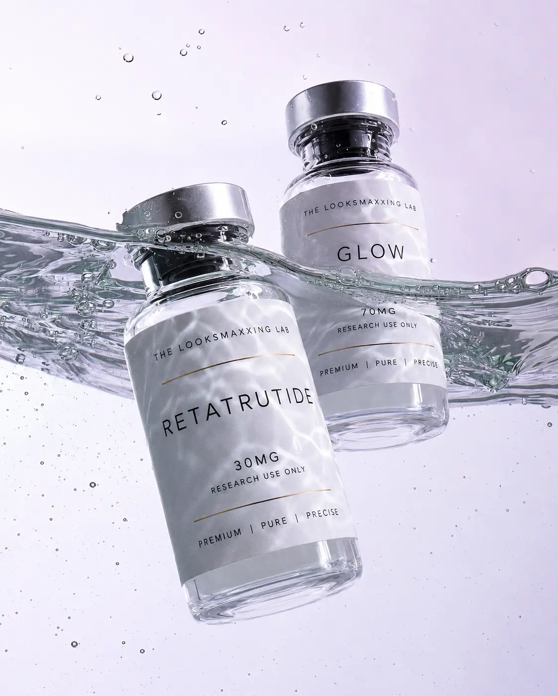 The Looksmaxxing Lab GLP-3 (Rt) (30mg) and Glow (70mg) research peptide vials splashing through water, research use only